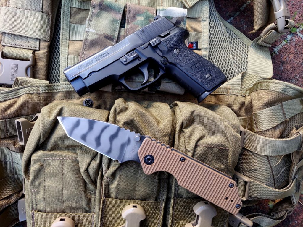Strider GB Knive review, next to Sig P228