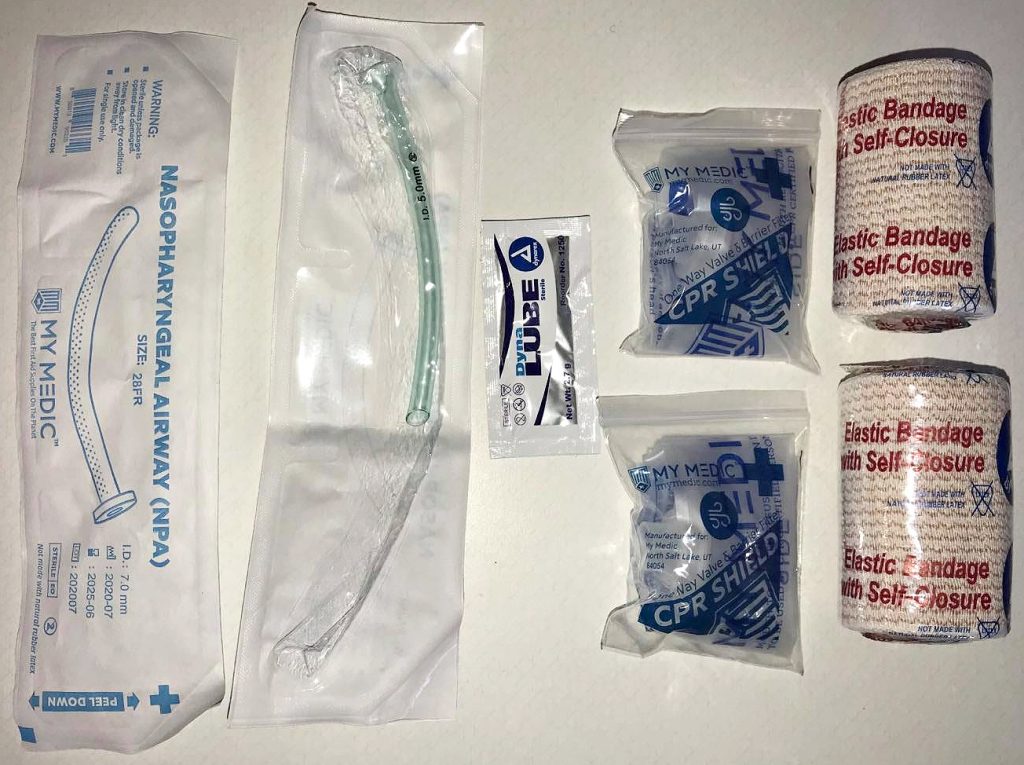 MyMedic MyFAK nasal airway, CPR Shield, Elastic bandage with self closure.