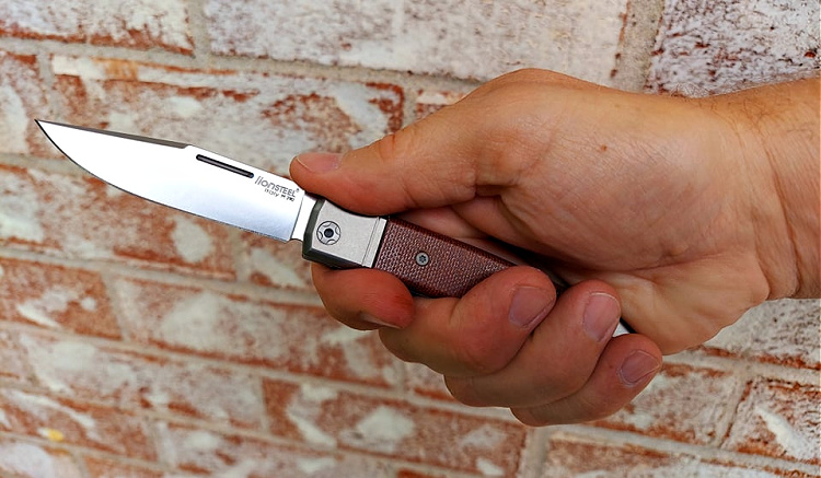 LionSteel BestMan knife in hand